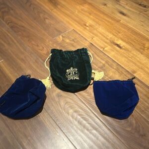 Three velvety covers. One is from a whisky brand.